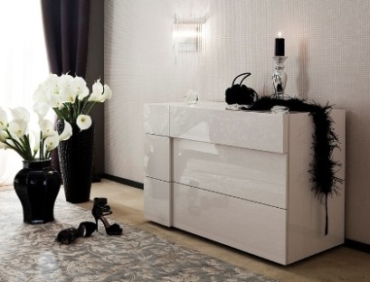 White glossy chest of drawers without handles