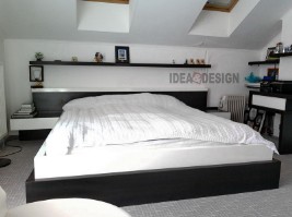 Photo of a double bed with bedside tables