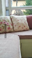 Custom sofa cushions on the window