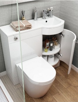 Cupboard with a small sink and toilet